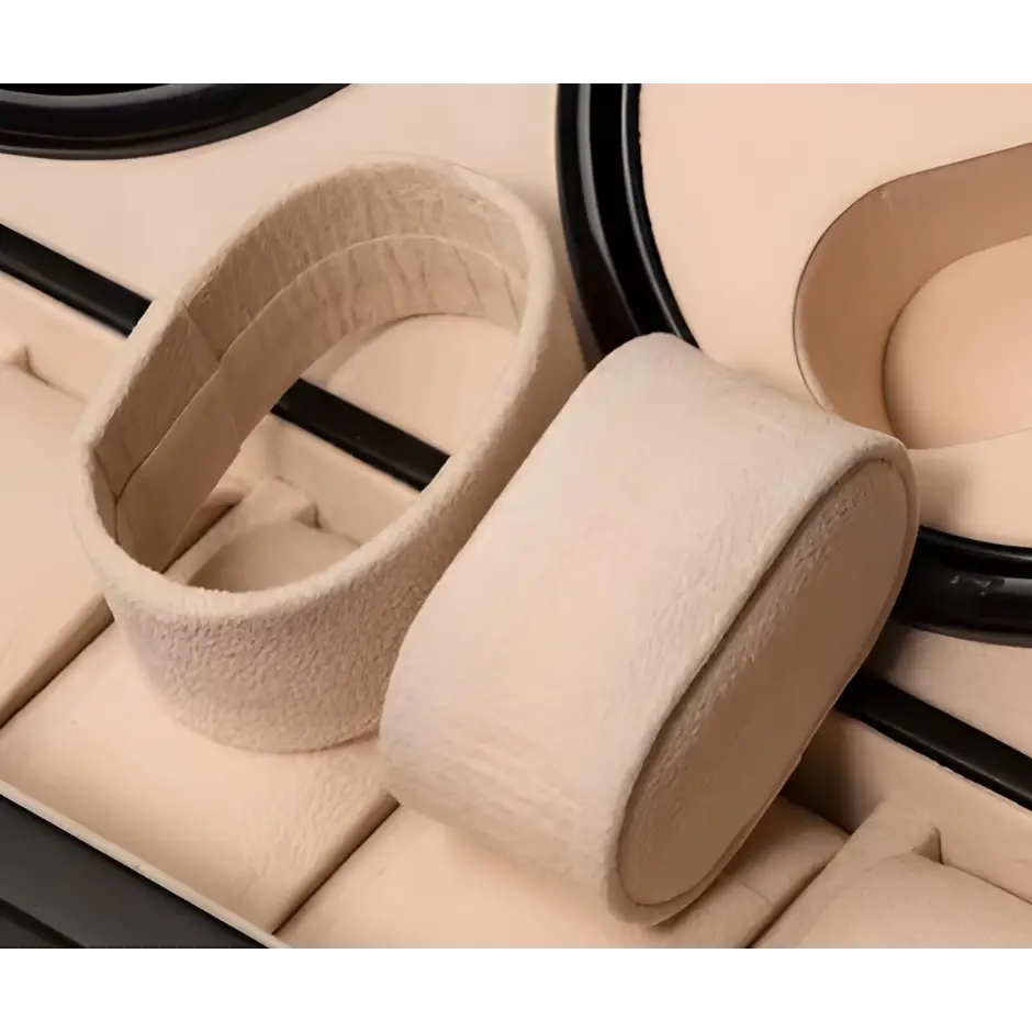 Close-up of the removable beige watch cushions of the Kensington